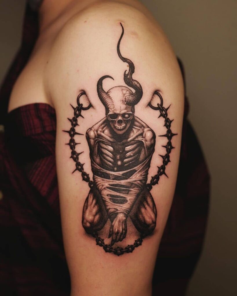 11+ Macabre Tattoo Ideas that Will Blow Your Mind! 11 Skeleton Prisoner Tattoo