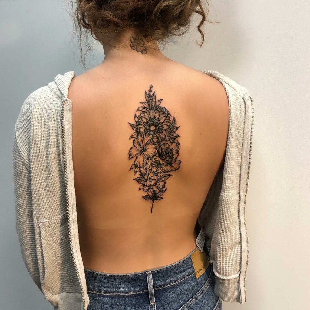 11+ Flower Spine Tattoo Ideas That Will Blow Your Mind! 20 Small Back Spine Flower Bouqet Tattoo