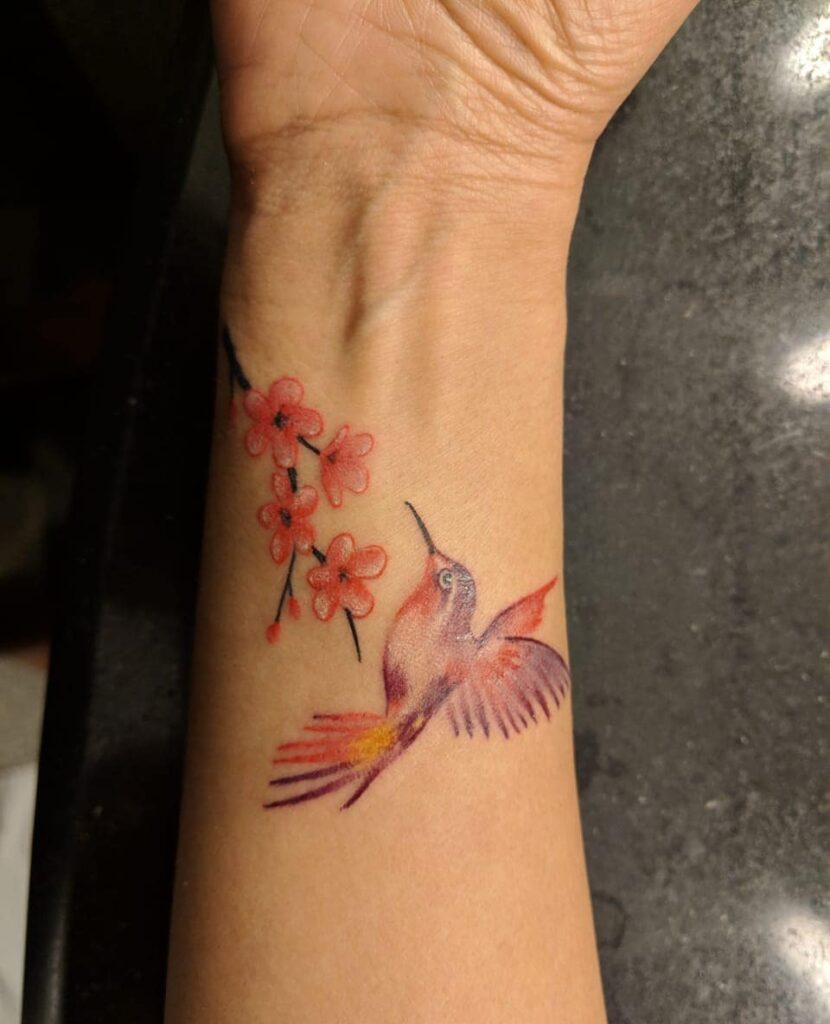 11+ Hummingbird Tattoo With Flowers That Will Blow Your Mind! 19 Small Hummingbird With Flowers Tattoos