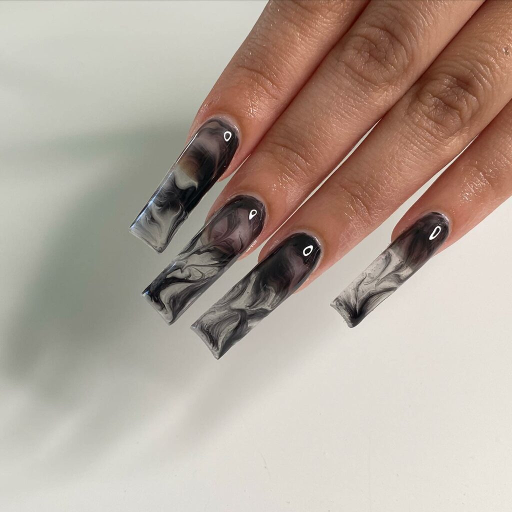 Get Spooky with 33 Black Halloween Nails To Try in 2024 14 Smoky Black Black Halloween nails
