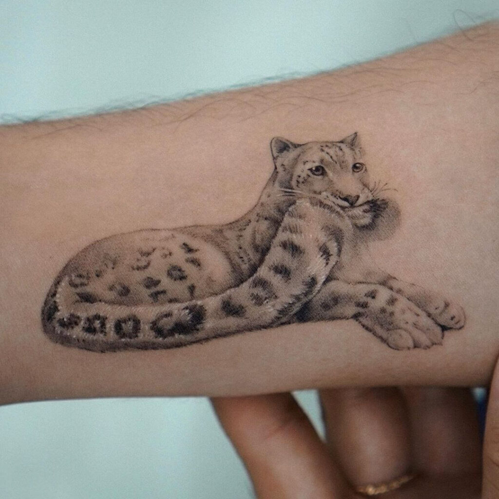 12+ Best Snow Leopard Tattoo Ideas To Inspire You! 14 Snow Leopard Biting Own Tail Tattoo
