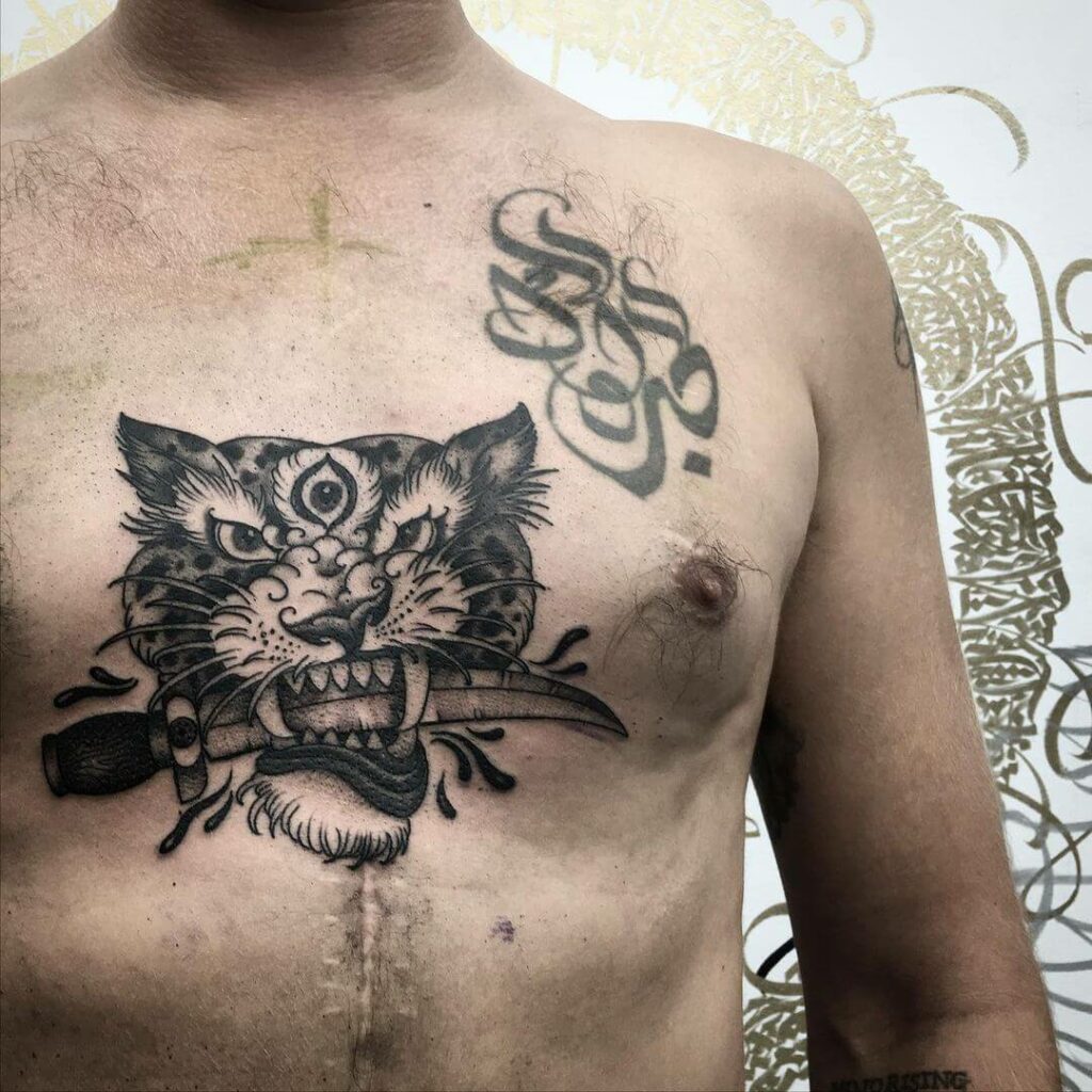 12+ Best Snow Leopard Tattoo Ideas To Inspire You! 16 Snow Leopard Chest Tattoo