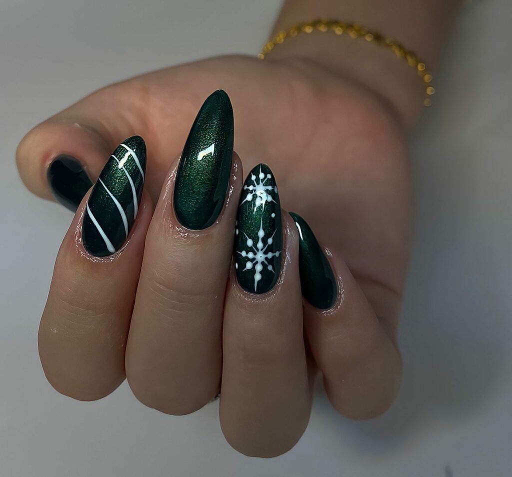 Feel the Nature with 31 Forest Green Nail Designs in 2024 25 Forest Green Nails Adorned with Snowflakes