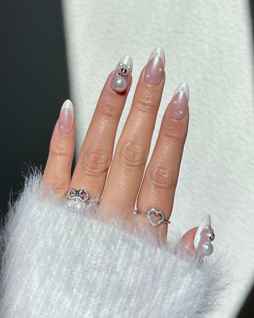 Immerse in Magic with 33 Disney Christmas Nail Ideas in 2024 30 Snowman Disney Christmas Nails with Pearls