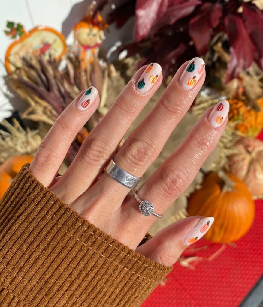 26 Latest Pumpkin Nail Designs To Try This Halloween 19 Speckled Orange