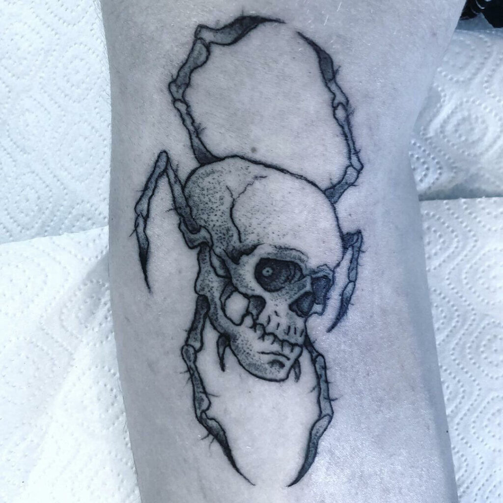 11+ Corpse Tattoo Ideas That Will Blow Your Mind! 16 Spider With Skull Tattoo