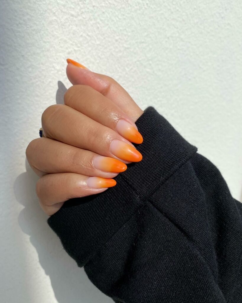 40 Latest Orange Nail Designs to Try in 2024 32 Sporty Orange Stripes