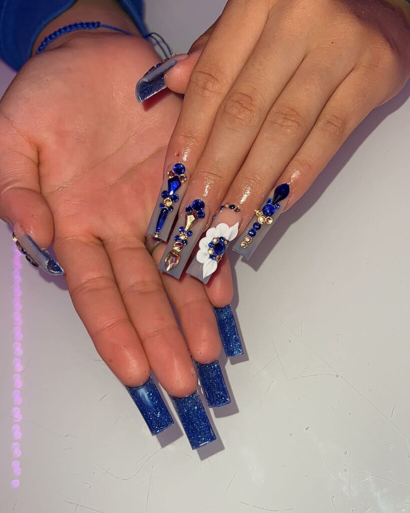 34 Latest Blue Acrylic Nail Designs To Try in 2024 34 Deep Blue with Dazzling Accents