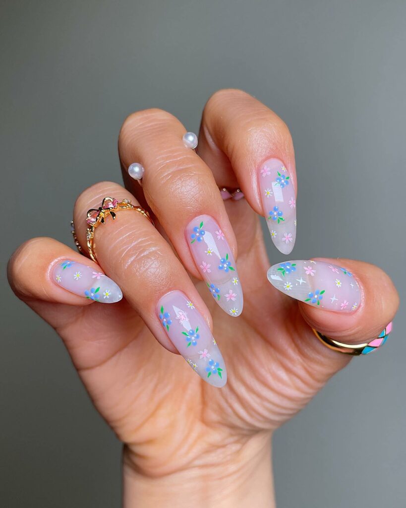 2024's Latest Flower Nail Designs: 29 Designs to Try 21 Stars flower nails