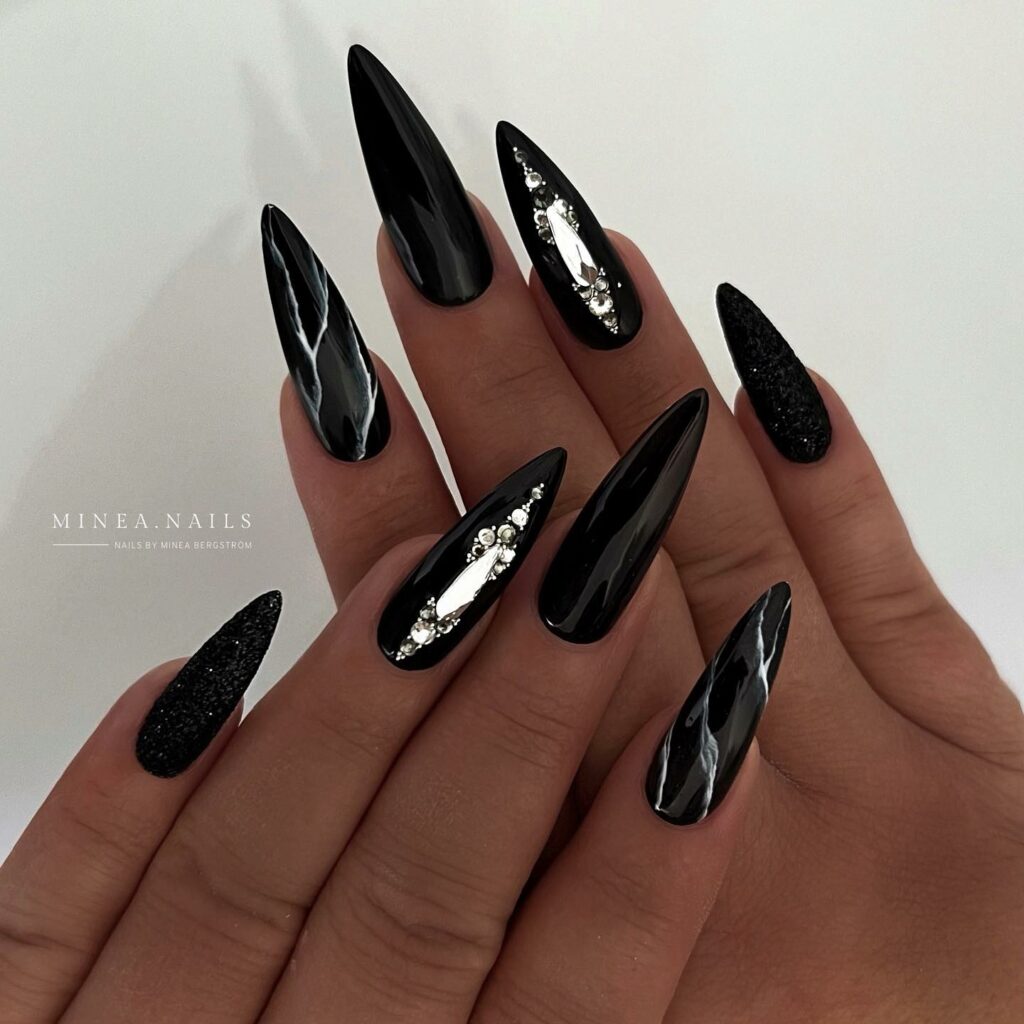 20 Latest Black Christmas Nails Ideas To Inspire You In 2024! 17 Stiletto Black Christmas Nails with Gems