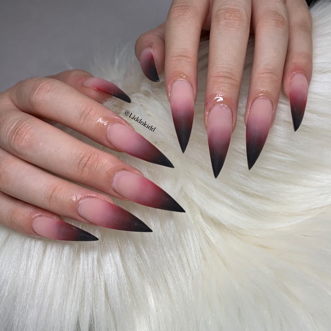 44 Latest Black Ombré Nail Designs To Try In 2024! 12 Edgy Sophistication with Stiletto Black Ombré Nails