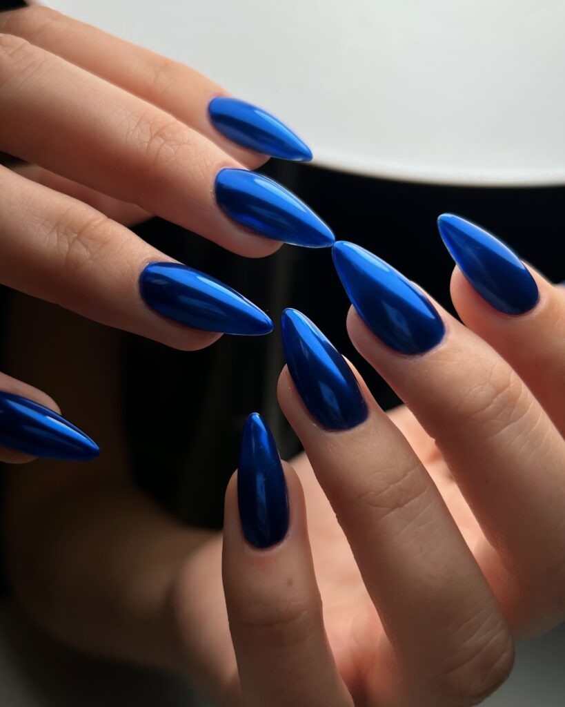 25 Latest Chrome Nail Ideas To Try In 2024! 12 Edgy Sophistication of Stiletto Blue Chrome Nails
