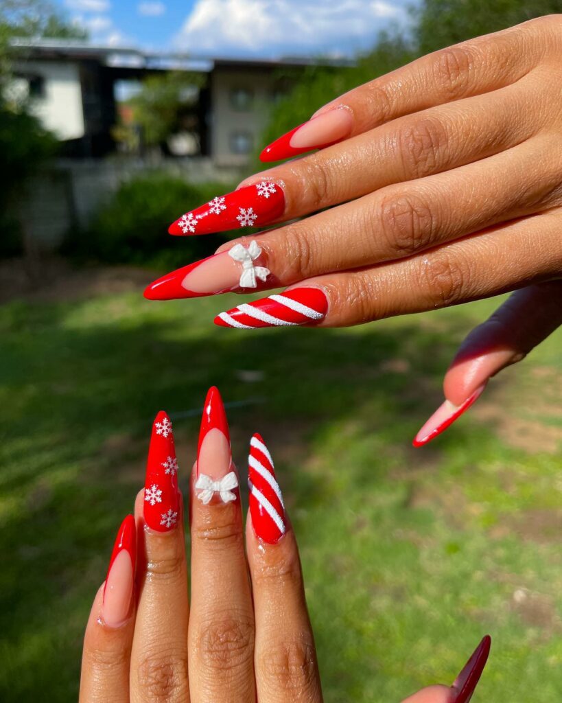 Enjoy 20 Candy Cane Nail Designs in 2024 14 Sleek Stiletto Candy Cane Nails