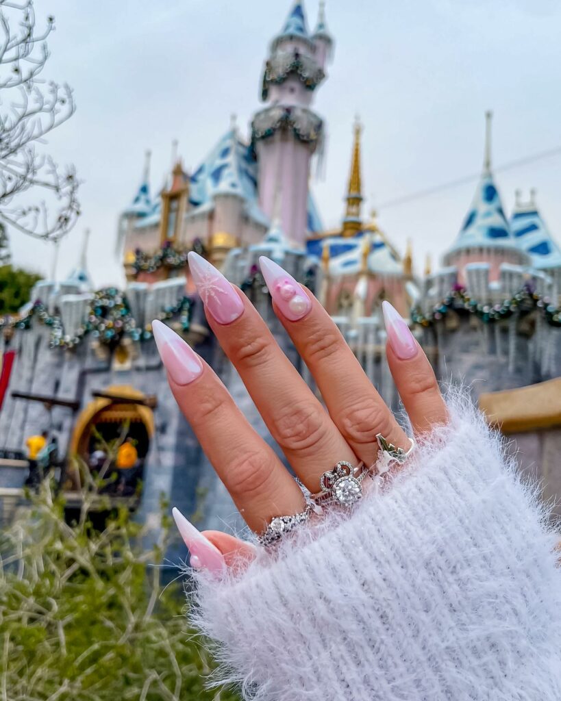 Immerse in Magic with 33 Disney Christmas Nail Ideas in 2024 15 Stiletto Pink Disney Christmas Nails