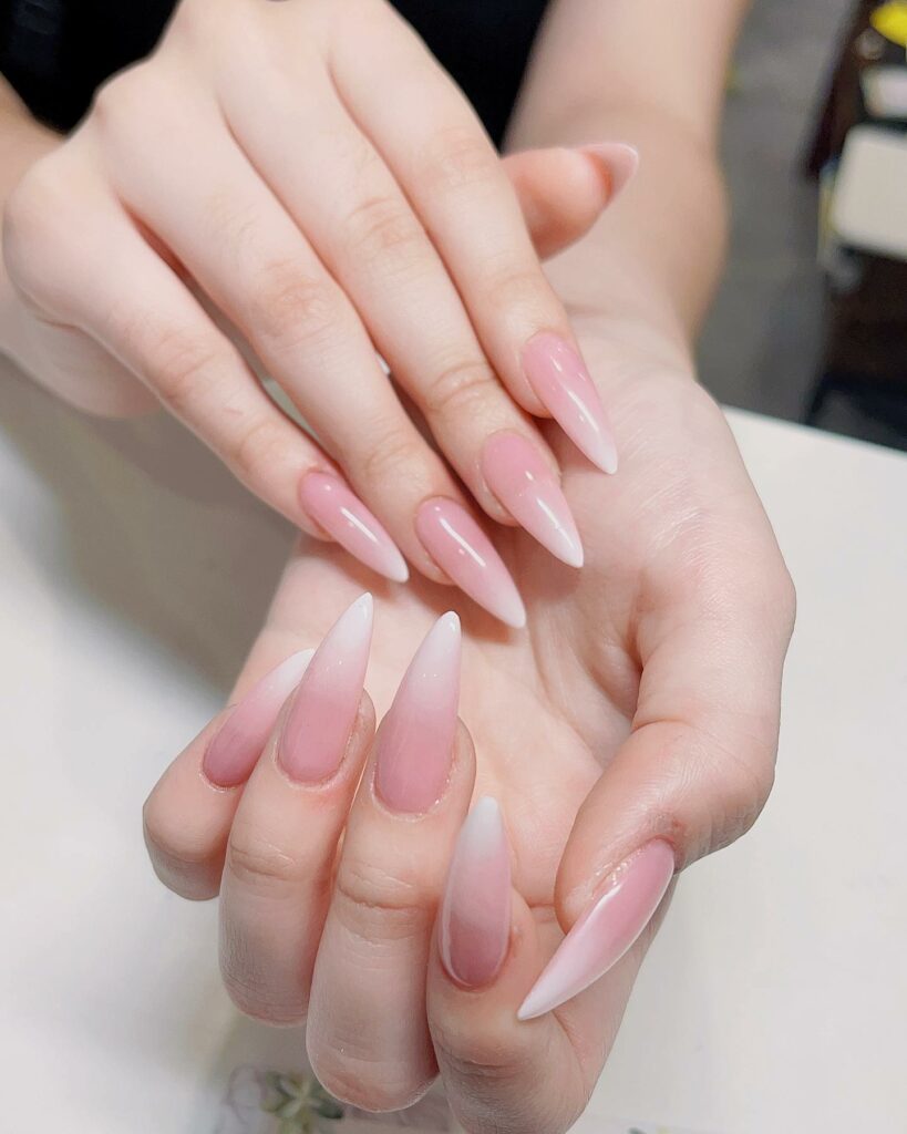 2024's Latest Pink Ombre Nails: 29 Designs to Try 12 Stiletto Pink and White Ombre Nails