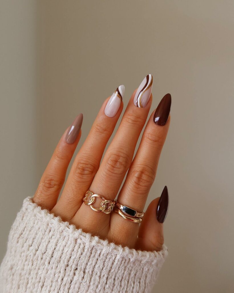 49 Latest Thanksgiving Nail Designs For 2024 11 Subtle Brown Squiggles