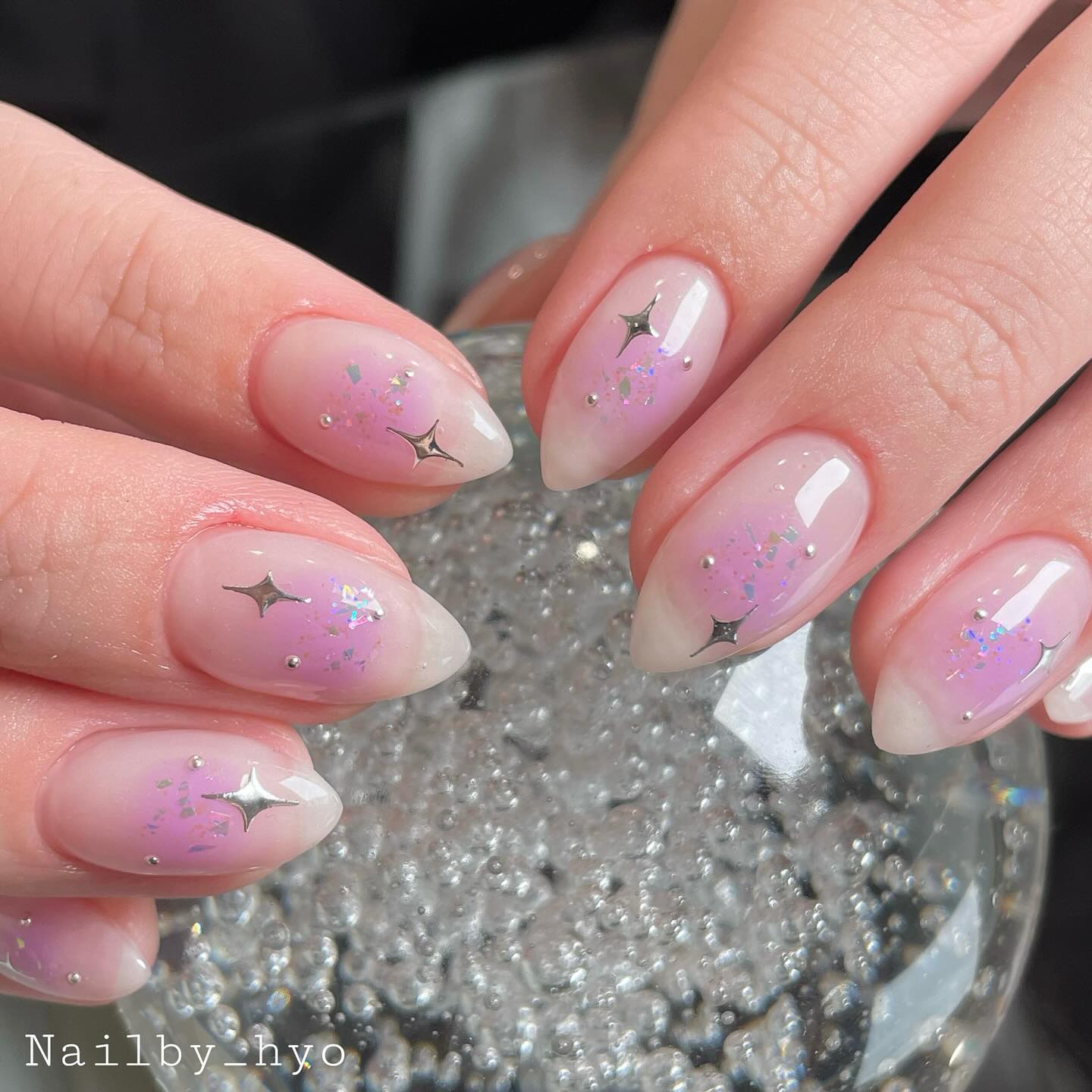 30 Latest Almond Nail Designs To Try in 2024! ⭐ 10 Subtle Almond Pink Sparkle with Star Decals