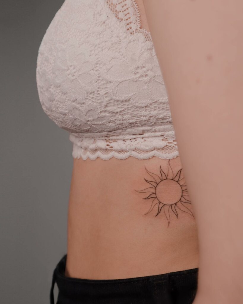 11+ Women Ribs Tattoo Ideas That Will Blow Your Mind! 15 Sun Rib Tattoo