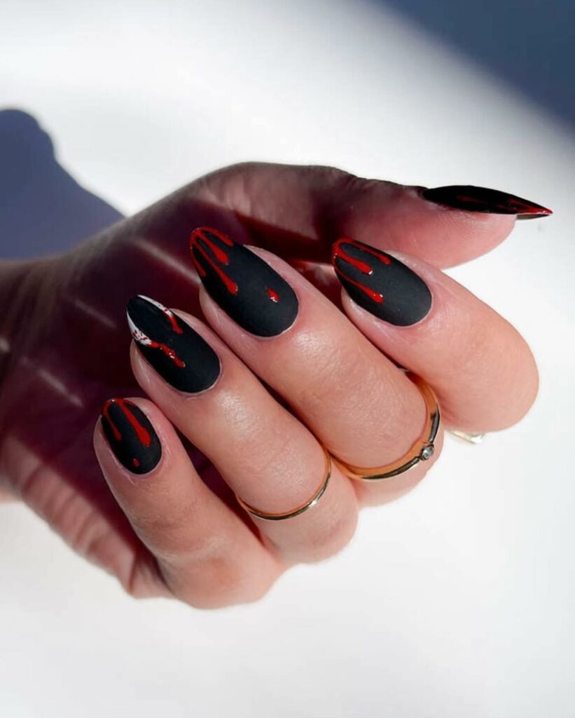 Embrace the Night with 33 Vampire Nail Designs for 2024 23 Swirling Blood Art Nails