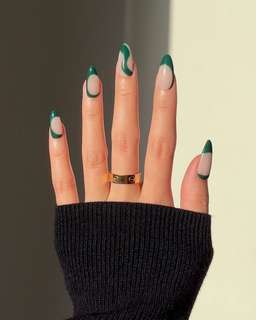 Get Festive with 25 Green Christmas Nail Ideas in 2024 27 Swirly Patterns on Lush Green Christmas Nails