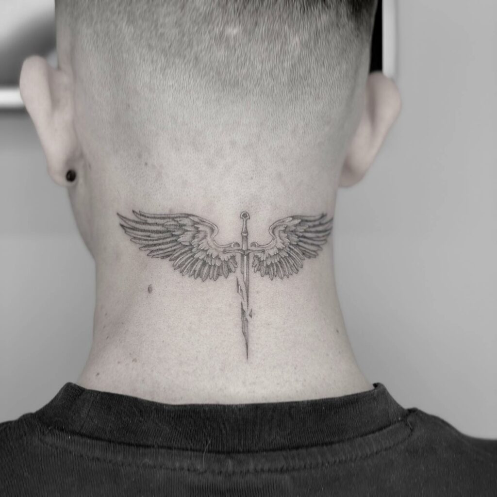 12 Wings Neck Tattoo Ideas for 2024 13 Sword And Wings Back Neck Tattoo
