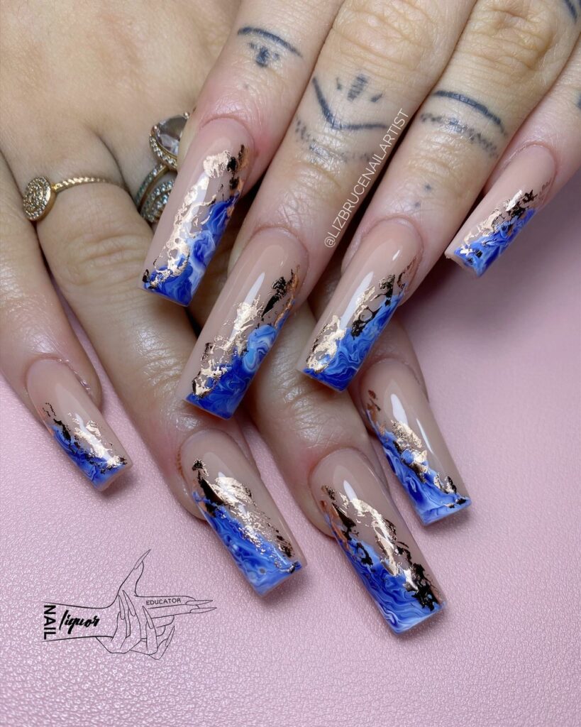 Shine Bright with 50 Rose Gold Nail Designs for 2024 26 Terracotta and Blue rose gold nails