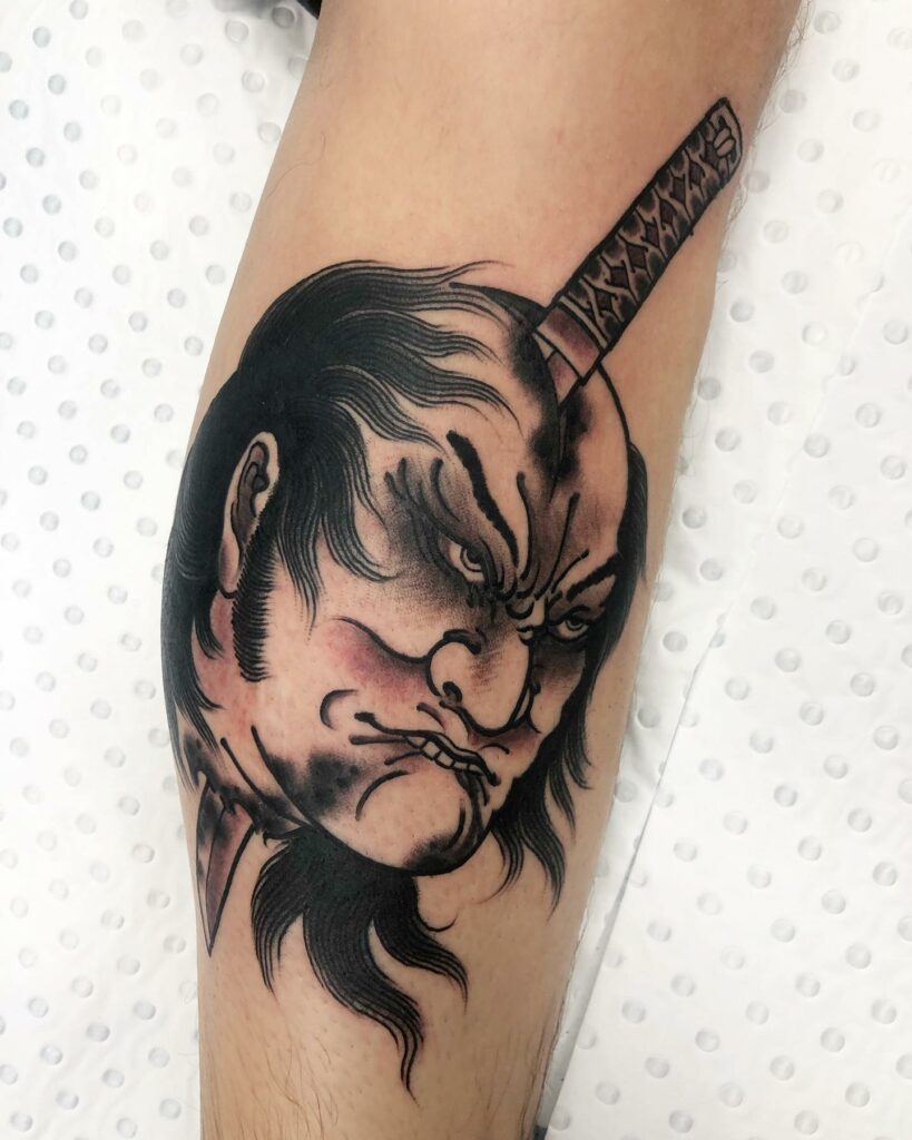 11+ Samurai Head Tattoo Ideas That Will Blow Your Mind! 13 The Black Namakubi Tattoo