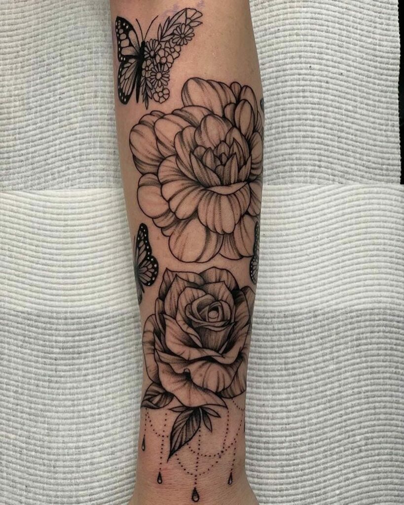 10+ Flower Forearm Tattoo Ideas That Will Blow Your Mind! 11 The Bold Fineline Rose and Marigold Tattoo