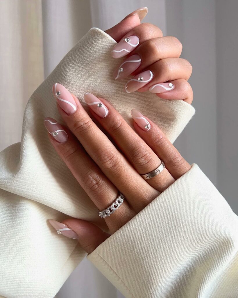 Rock 25 Chic White Almond Nail Designs in 2024 29 The Charm of Pink and White Almond Nail Designs