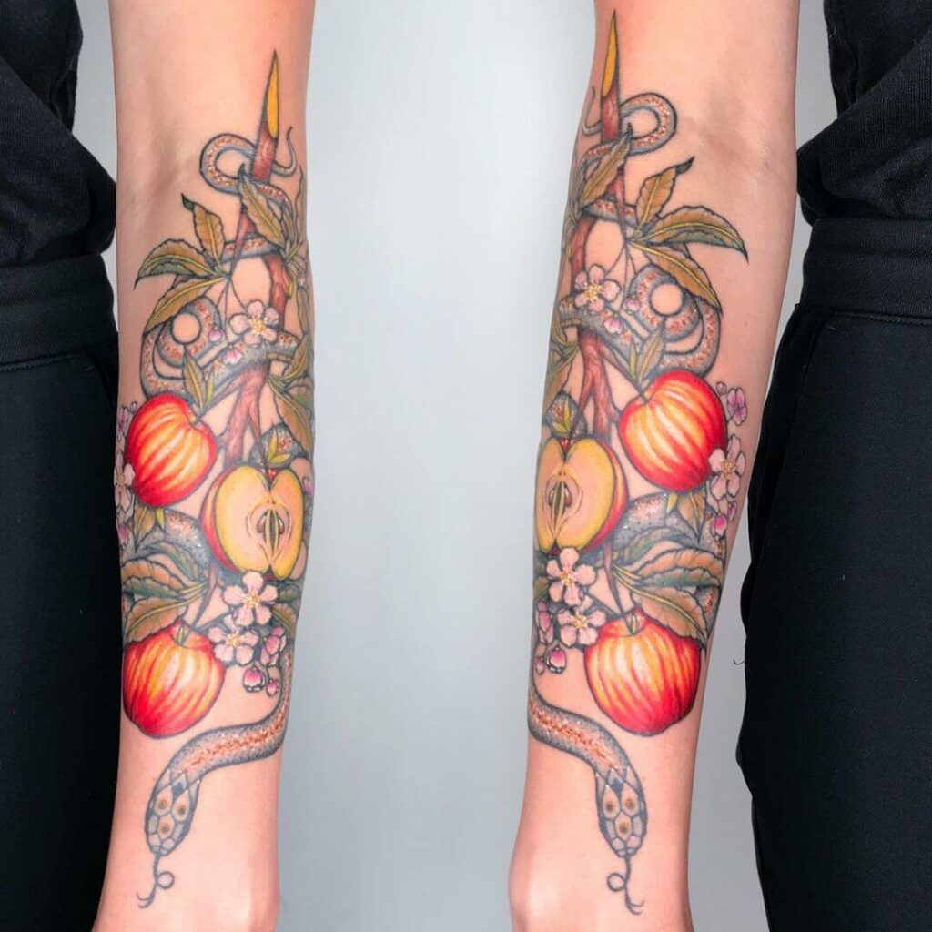 16 Latest Apple Tattoos To Inspire You In 2024! 11 The Chic And Pristine Apple Flower Tattoo