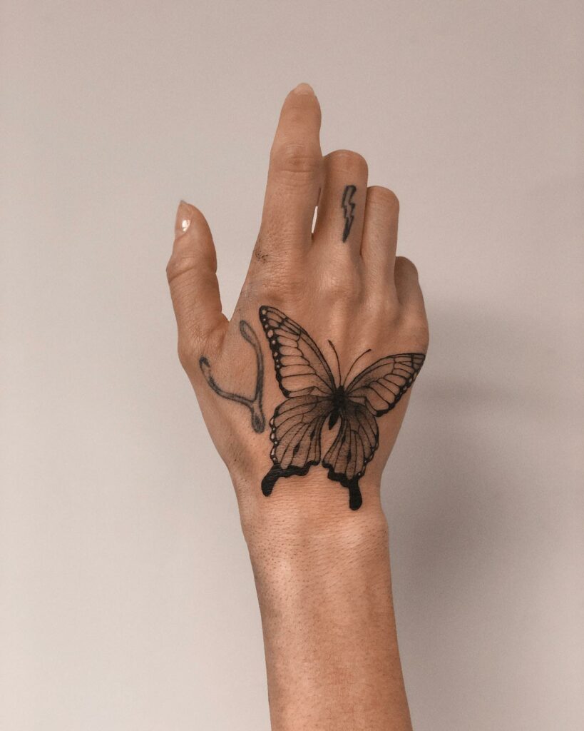19+ Women's Hand Tattoo Ideas To Inspire You! 15 The Delicate Butterfly Tattoo of Inspiration