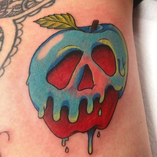 16 Latest Apple Tattoos To Inspire You In 2024! 12 The Disney-Inspired Classic Poisoned Apple Tattoo