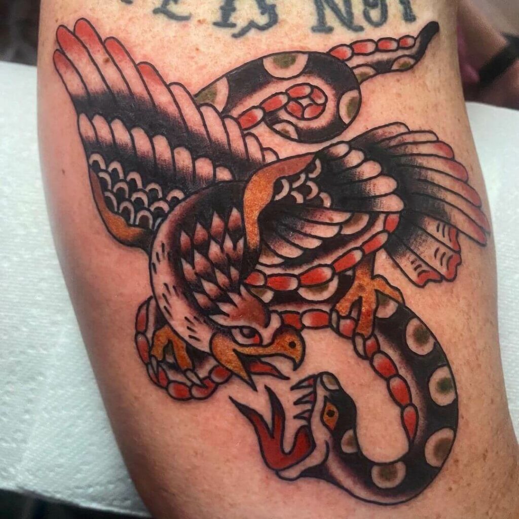 11+ Neo Traditional Eagle Tattoo Ideas That Will Blow Your Mind! 17 The Eagle X Snake Fierce Fighting Tattoo Design