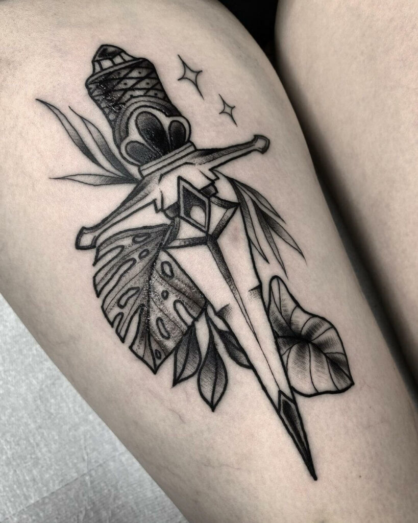 12+ American Traditional Dagger Tattoo Ideas That Will Blow Your Mind! 20 The Enchanting Jungle Dagger
