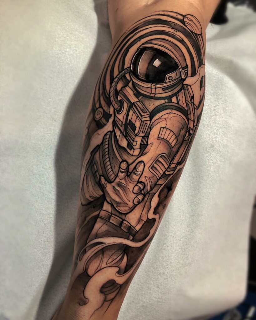 10+ Simple Astronaut Tattoo Ideas That Will Blow Your Mind! 18 The Famous American Astronaut tattoo Design