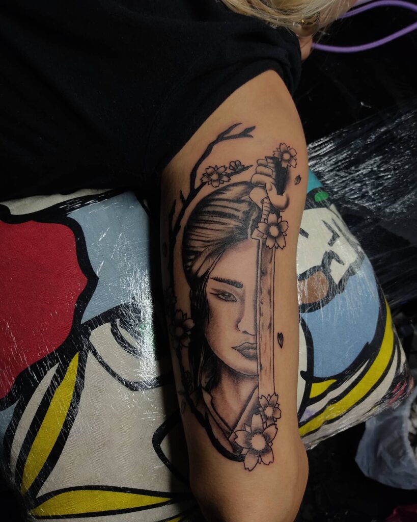 11+ Samurai Head Tattoo Ideas That Will Blow Your Mind! 19 The Female Samurai and Sword Tattoo