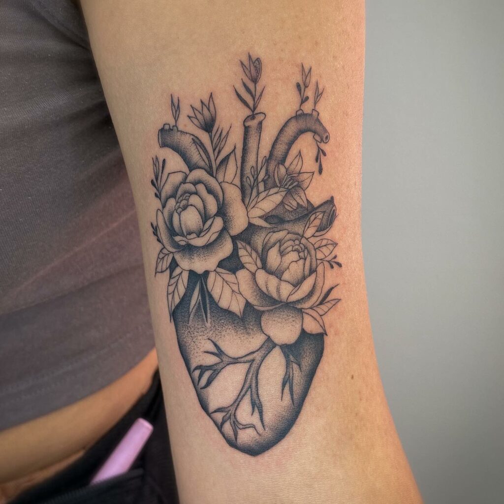11+ Girly Heart Tattoo Ideas That Will Blow Your Mind! 11 The Flowers Growing On Heart Tattoo
