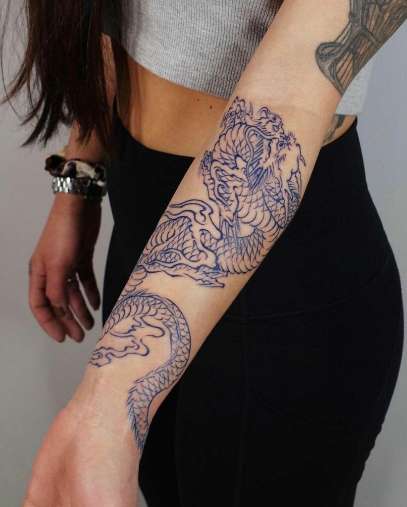 10+ Dragon Tattoo Ideas You'll Have To See To Believe! 11 The Girl With The Dragon Forearm Tattoo