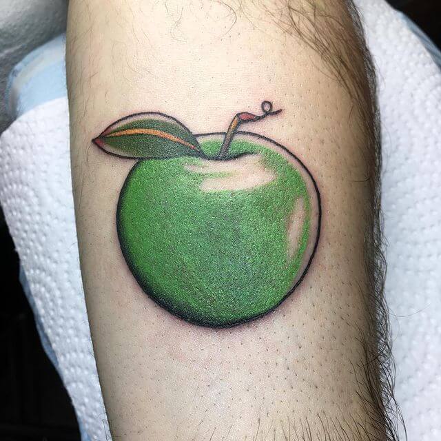 16 Latest Apple Tattoos To Inspire You In 2024! 24 The Green Apple Tattoo For Healthy Eaters