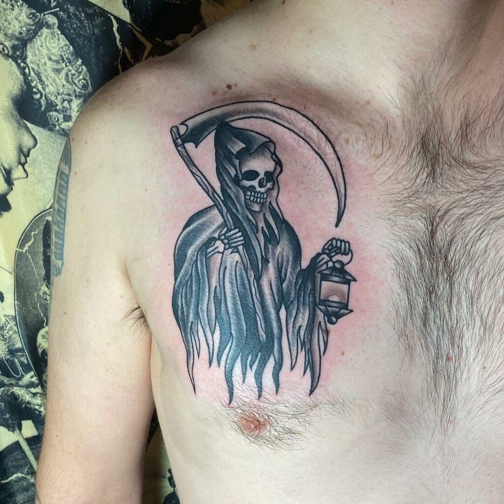 11+ Grim Reaper Chest Tattoo Ideas That Will Blow Your Mind! 14 The Grim Reaper And The Lantern