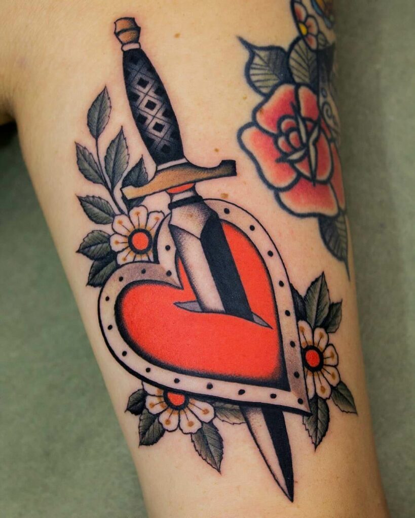 12+ American Traditional Dagger Tattoo Ideas That Will Blow Your Mind! 13 The Heart Dagger Tattoo