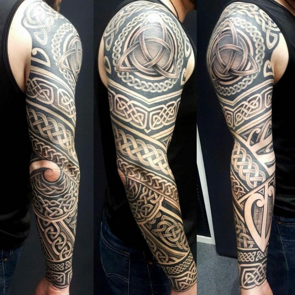 46 Celtic Half-Sleeve Tattoo Ideas for 2024 17 The Holy Trinity Celtic Sleeve