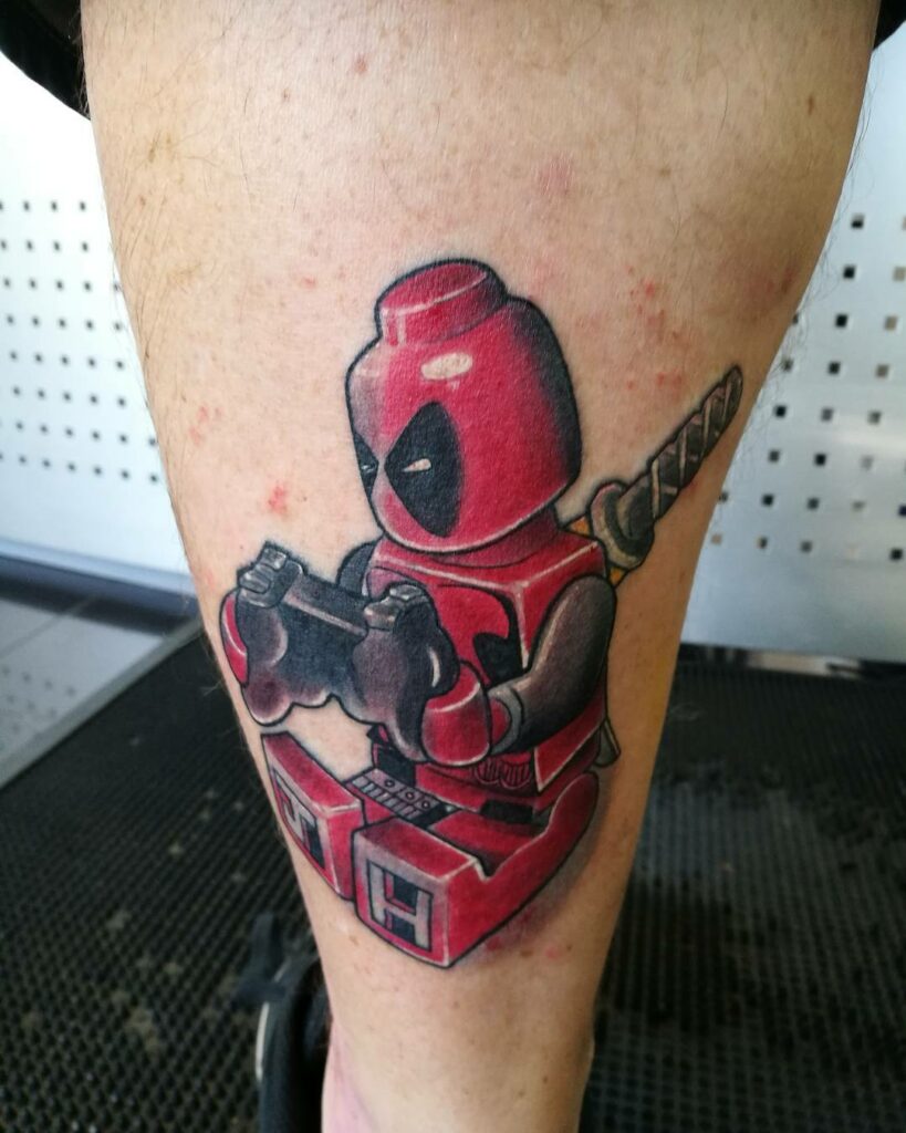 11+ Deadpool Tattoo Ideas You'll Have To See To Believe! 16 The Lego Themed Little Deadpool Tattoo