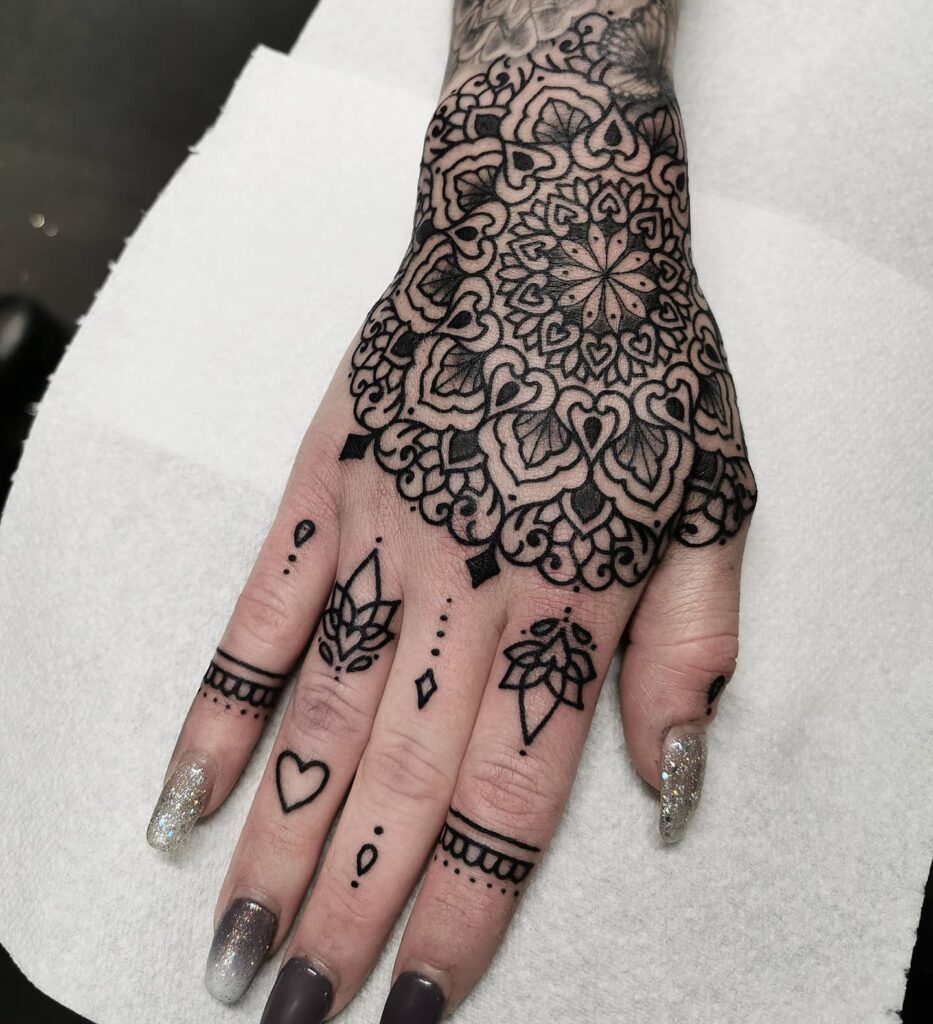 19+ Women's Hand Tattoo Ideas To Inspire You! 17 The Mandala Hand Tattoo Fashioned With Clean Lines