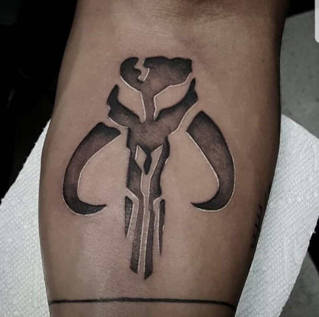 10+ Mandalorian Helmet Tattoo Ideas That Will Blow Your Mind! 13 The Mythosaur Skull Tattoo