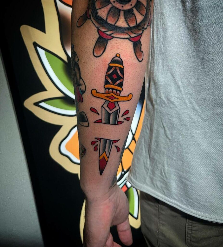 12+ American Traditional Dagger Tattoo Ideas That Will Blow Your Mind! 12 The Old School Dagger