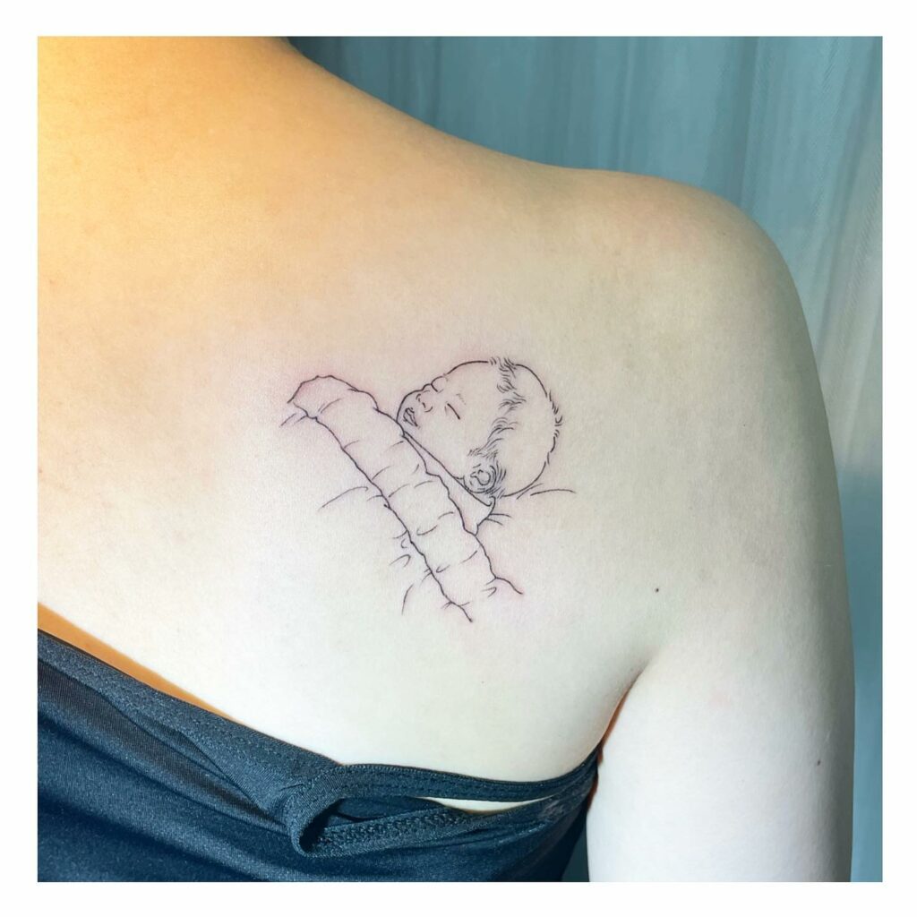 10+ Baby Tattoo For Mom Ideas That Will Blow Your Mind! 14 The Sleeping Baby Tattoo