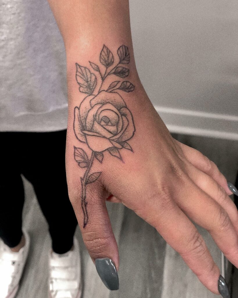 19+ Women's Hand Tattoo Ideas To Inspire You! 14 The Subtle Rose Tattoo Style ideas