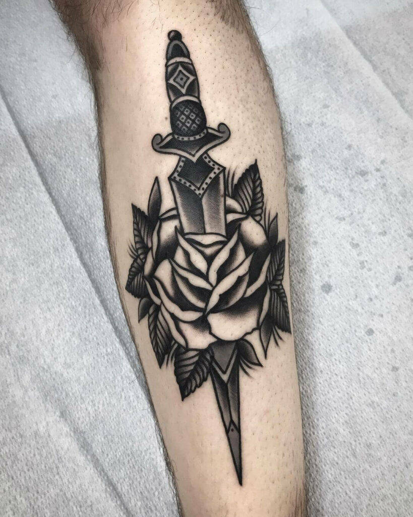 12+ American Traditional Dagger Tattoo Ideas That Will Blow Your Mind! 11 The Traditional Black Dagger