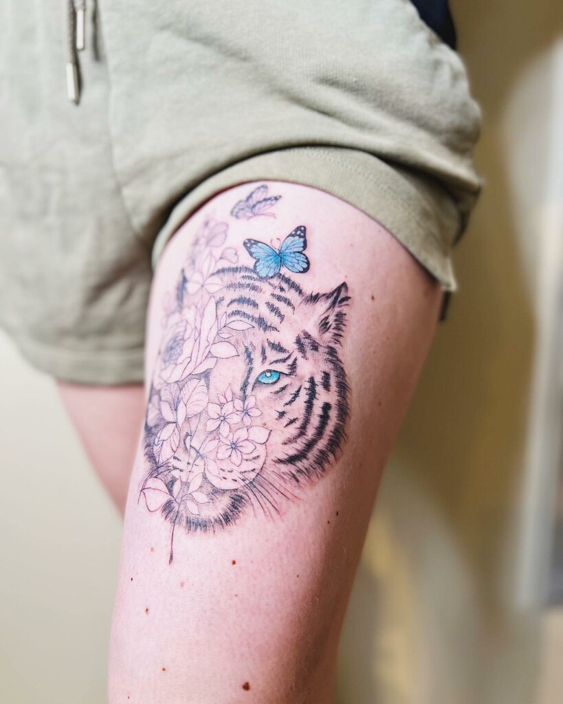 12+ Tiger Thigh Tattoo Ideas That Will Blow Your Mind! 14 Tiger Thigh Tattoo With Butterflies
